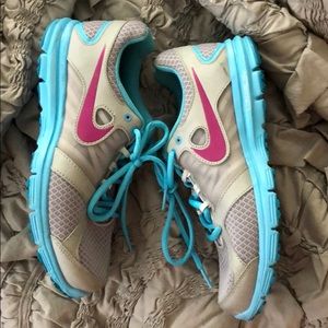 Pink and blue Nike sneakers